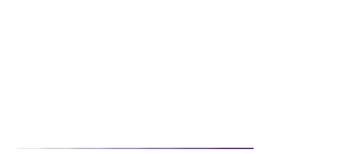 A young child wearing a red shirt and blue shorts plays with a yellow toy car on a white tiled floor.